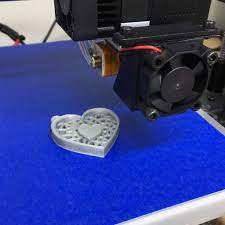 Cleaning a 3D print bed with tape